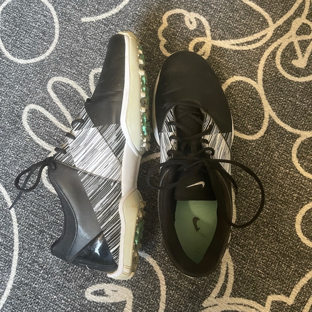 Black and white Nike women’s golf shoes